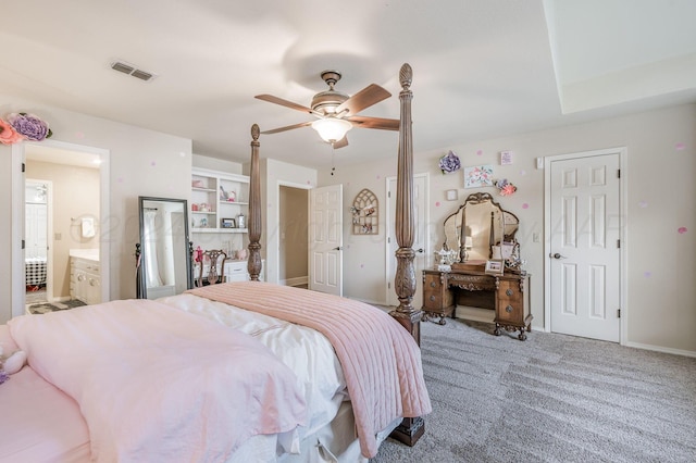 carpeted bedroom featuring ceiling fan and ensuite bathroom