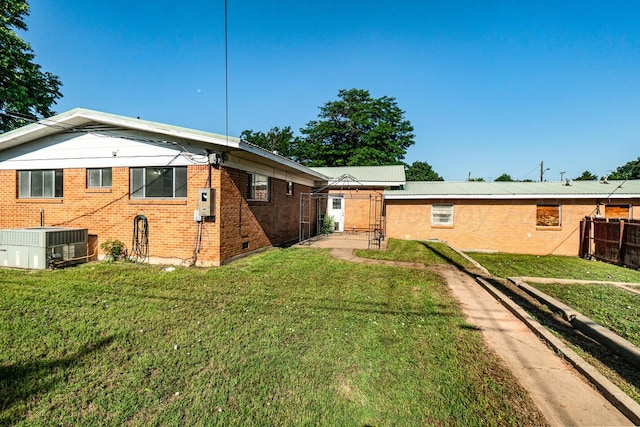213 Union St, Borger, TX 79007 - back of house featuring brick siding