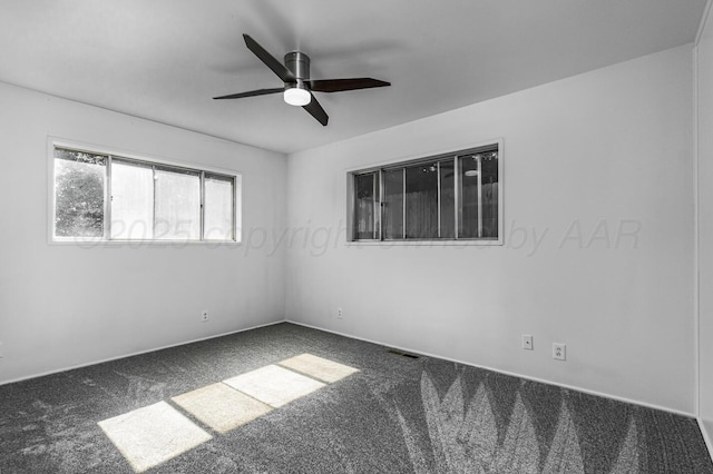 213 Union St, Borger, TX 79007 - spare room featuring carpet flooring and a ceiling fan