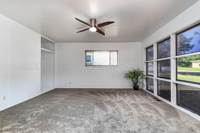 213 Union St, Borger, TX 79007 - spare room with carpet floors and ceiling fan