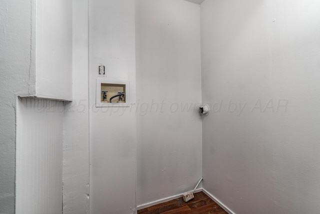 213 Union St, Borger, TX 79007 - washroom featuring dark wood-style flooring and hookup for a washing machine