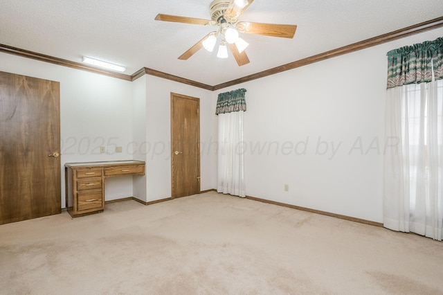 3457 Colchester Pl, Amarillo, TX 79121 - unfurnished bedroom featuring ceiling fan, a textured ceiling, crown molding, baseboards, and light carpet