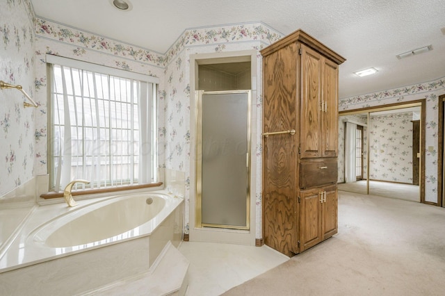 3457 Colchester Pl, Amarillo, TX 79121 - bathroom featuring visible vents, a garden tub, a shower stall, and wallpapered walls