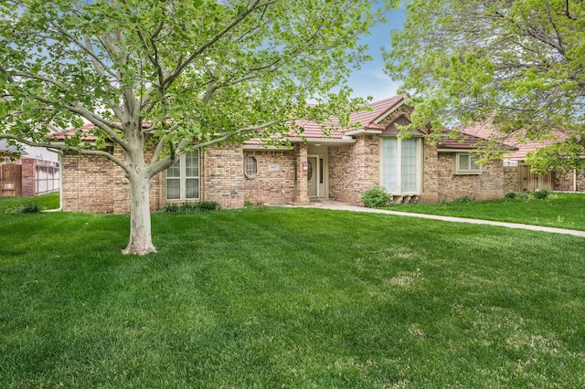3457 Colchester Pl, Amarillo, TX 79121 - single story home with a front lawn, fence, and a tile roof