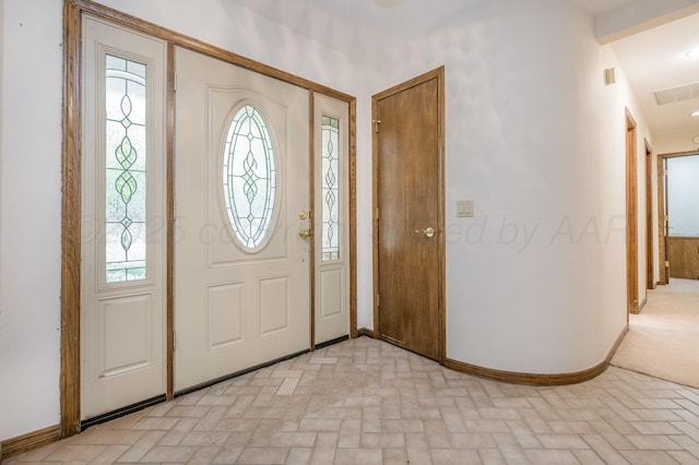 3457 Colchester Pl, Amarillo, TX 79121 - foyer entrance featuring visible vents, baseboards, and brick patterned floor