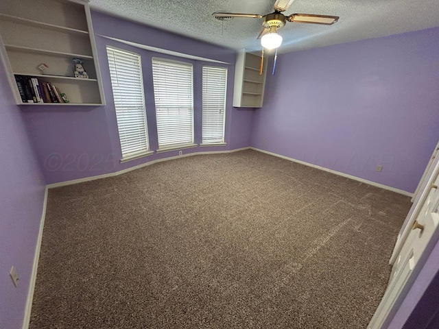 7906 Merchant Dr, Amarillo, TX 79121 - empty room with ceiling fan, baseboards, a textured ceiling, and carpet floors