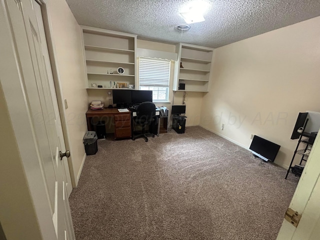 7906 Merchant Dr, Amarillo, TX 79121 - carpeted office space with baseboards, visible vents, and a textured ceiling