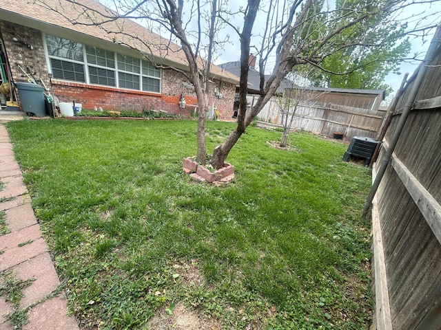 7906 Merchant Dr, Amarillo, TX 79121 - view of yard featuring cooling unit and a fenced backyard