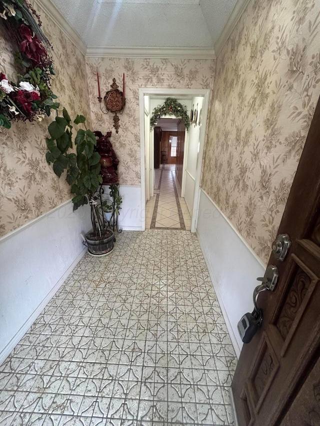 7906 Merchant Dr, Amarillo, TX 79121 - hallway featuring light tile patterned floors, baseboards, and ornamental molding