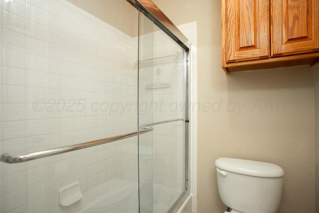 8103 El Paso Dr, Amarillo, TX 79118 - bathroom featuring toilet and combined bath / shower with glass door