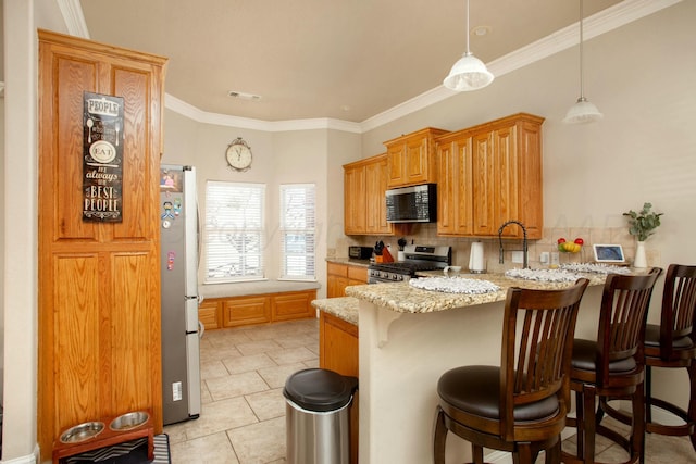 8103 El Paso Dr, Amarillo, TX 79118 - kitchen with appliances with stainless steel finishes, light stone countertops, a peninsula, tasteful backsplash, and ornamental molding