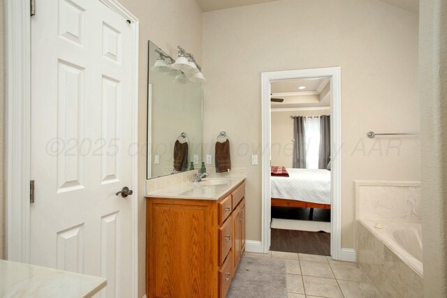 8103 El Paso Dr, Amarillo, TX 79118 - full bathroom featuring ensuite bathroom, vanity, tile patterned floors, crown molding, and a bathtub