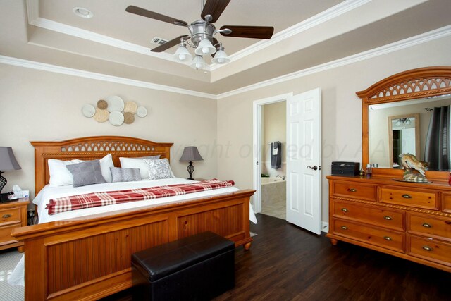 8103 El Paso Dr, Amarillo, TX 79118 - bedroom featuring a tray ceiling, dark wood-style flooring, crown molding, ensuite bath, and a ceiling fan