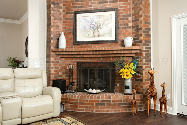 8103 El Paso Dr, Amarillo, TX 79118 - living room featuring crown molding, a brick fireplace, wood finished floors, and baseboards