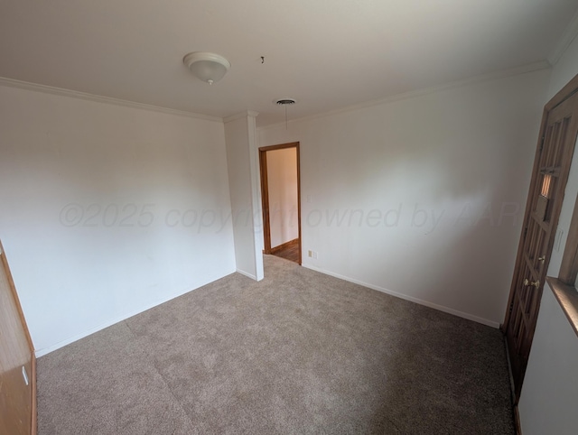 unfurnished room with carpet and ornamental molding