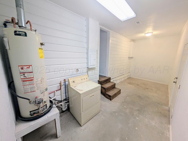 interior space with water heater and washer / clothes dryer