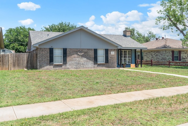 1321 Buena Vista St, Amarillo, TX 79106 - ranch-style house with brick siding, a shingled roof, and a chimney