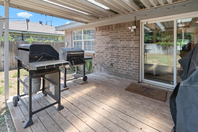 1321 Buena Vista St, Amarillo, TX 79106 - wooden deck featuring a fenced backyard and grilling area
