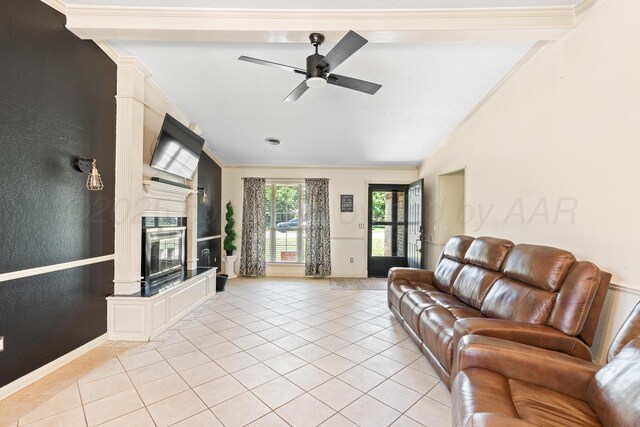 1321 Buena Vista St, Amarillo, TX 79106 - living room with crown molding, light tile patterned floors, ceiling fan, a premium fireplace, and vaulted ceiling