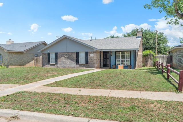 1321 Buena Vista St, Amarillo, TX 79106 - ranch-style house featuring brick siding and a chimney