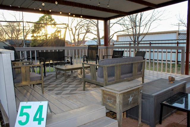 deck with outdoor dining space