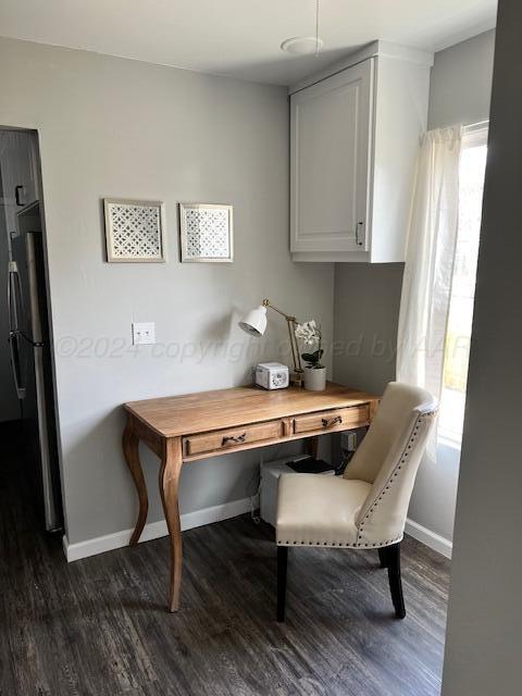 823 S Palo Duro St, Amarillo, TX 79106 - office featuring dark wood-style floors and baseboards
