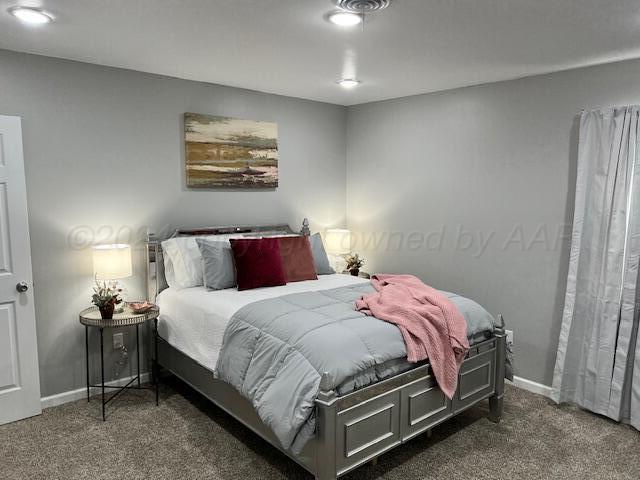 823 S Palo Duro St, Amarillo, TX 79106 - bedroom with carpet flooring and baseboards