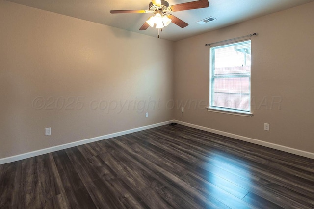 7406 Sinclair St, Amarillo, TX 79119 - unfurnished room with dark wood finished floors, baseboards, and ceiling fan