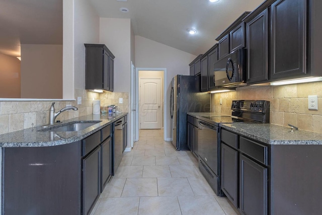 7406 Sinclair St, Amarillo, TX 79119 - kitchen featuring black appliances, a sink, decorative backsplash, lofted ceiling, and dark stone countertops