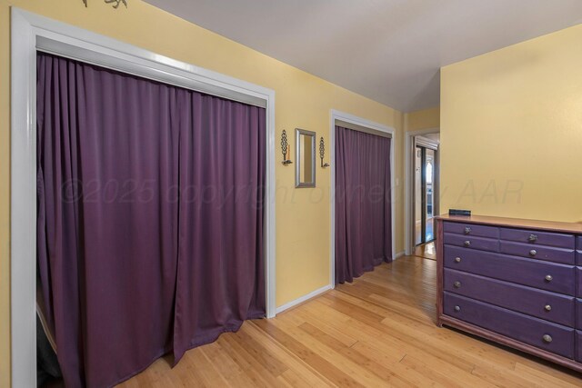 3515 Linda Dr, Amarillo, TX 79109 - corridor with light wood-style floors and baseboards