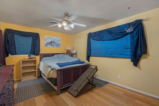3515 Linda Dr, Amarillo, TX 79109 - bedroom with wood finished floors and ceiling fan