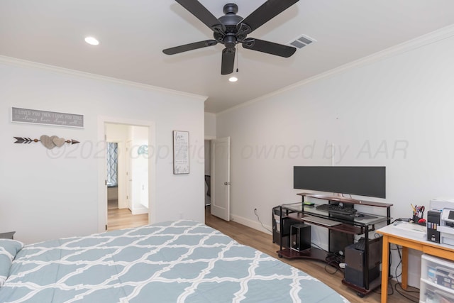 bedroom with crown molding, visible vents, baseboards, recessed lighting, and wood finished floors