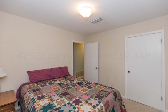 3604 SE 30th Ave, Amarillo, TX 79103 - bedroom with light carpet and baseboards