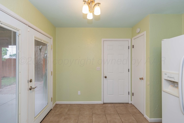 3604 SE 30th Ave, Amarillo, TX 79103 - entrance foyer with light tile patterned floors and baseboards