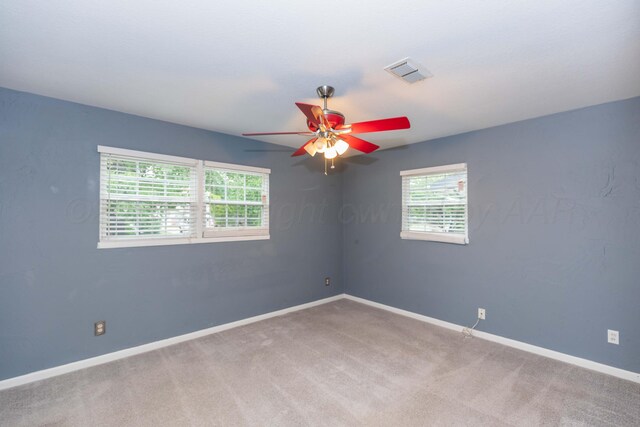 3604 SE 30th Ave, Amarillo, TX 79103 - spare room with ceiling fan, carpet, and baseboards