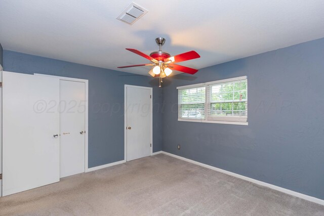 3604 SE 30th Ave, Amarillo, TX 79103 - unfurnished bedroom with carpet floors, baseboards, and ceiling fan