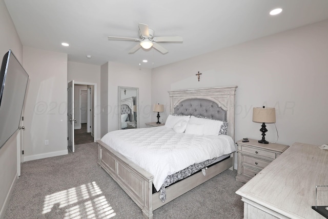 bedroom featuring light carpet and ceiling fan