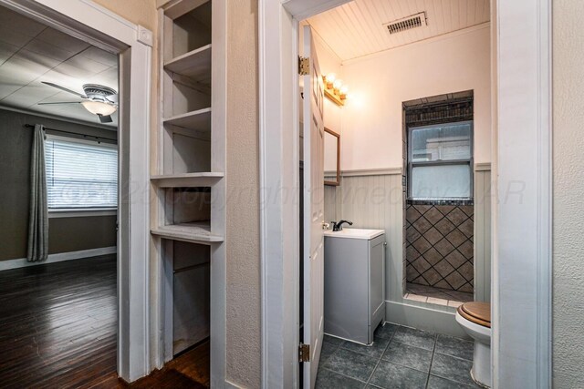 3704 Fountain Ter, Amarillo, TX 79106 - full bath featuring vanity, wainscoting, toilet, a ceiling fan, and tile patterned floors