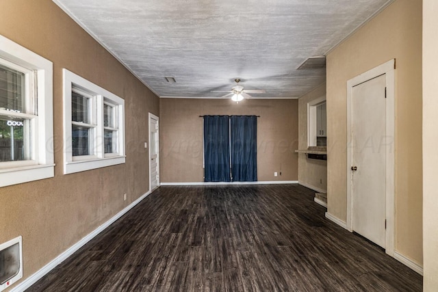 3704 Fountain Ter, Amarillo, TX 79106 - unfurnished room with wood finished floors, a ceiling fan, and baseboards