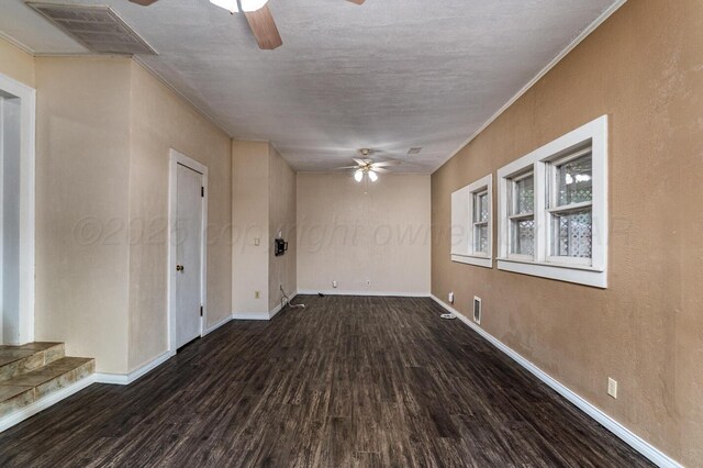 3704 Fountain Ter, Amarillo, TX 79106 - empty room featuring ceiling fan, wood finished floors, ornamental molding, and baseboards
