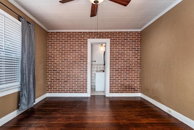 3704 Fountain Ter, Amarillo, TX 79106 - spare room with a ceiling fan, hardwood / wood-style flooring, crown molding, baseboards, and brick wall