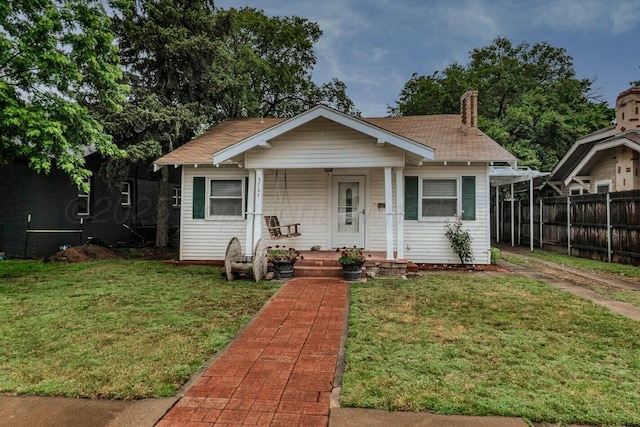 3704 Fountain Ter, Amarillo, TX 79106 - bungalow-style home with covered porch and a chimney