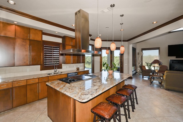 13 Prestwick Ln, Amarillo, TX 79124 - kitchen featuring island exhaust hood, light tile patterned floors, a center island, open floor plan, and crown molding