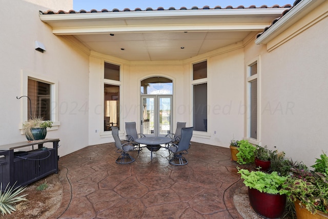 view of patio featuring french doors