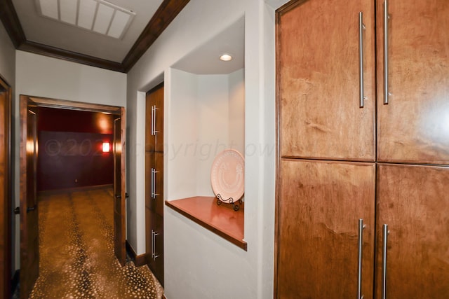 corridor with crown molding