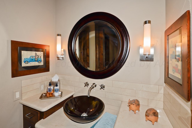 bathroom featuring backsplash and vanity