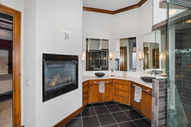 bathroom with walk in shower, tile patterned flooring, vanity, and ornamental molding