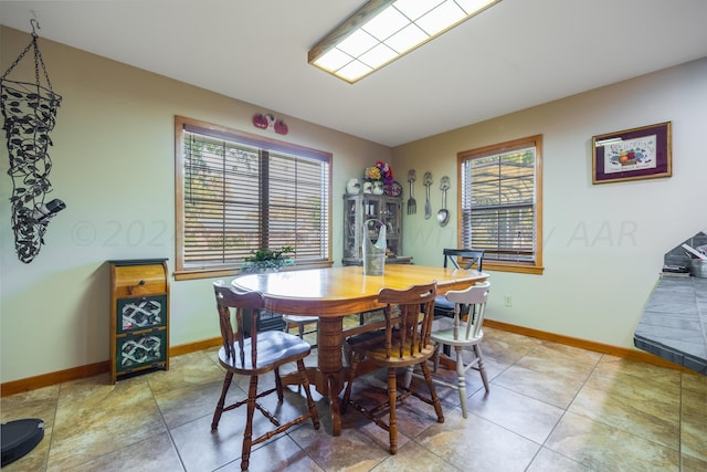 dining room featuring tile patterned floors