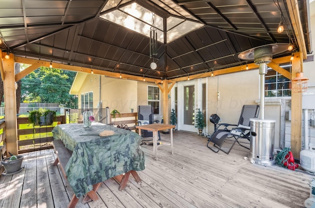 deck with a gazebo and a bar