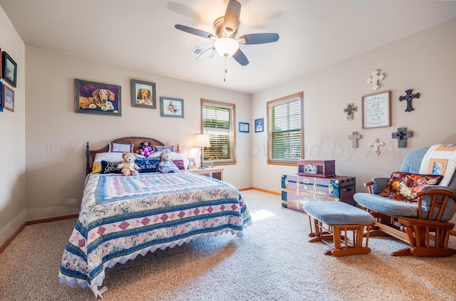 bedroom featuring light carpet and ceiling fan